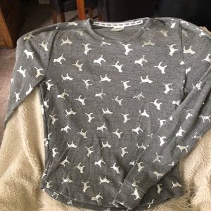 Pink long sleeve thermal shirt.